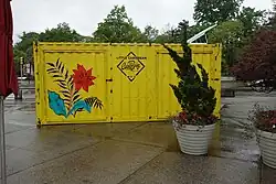 The caribBEING House, an upcycled shipping container used as a mobile art, culture, and market space that hosts exhibitions, cultural happenings and curated pop-up shops.[1] Photo taken at Parkside Plaza.