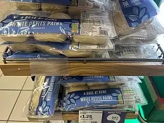 Part baked Petit Pains in a Sainsbury's store.