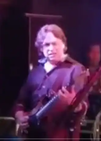 Thrall as an onstage guest at a Glenn Hughes show in 2016.