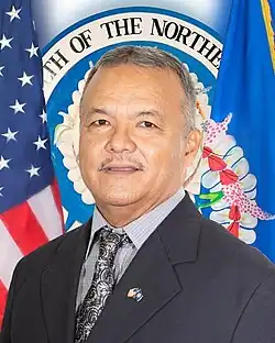 A headshot of Paul Mangloña
