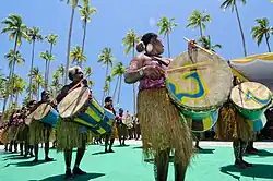 Tambur drum being played with a suling flute (center) in a Suling Tambur (flute-drum) combination in the Raja Ampat Islands