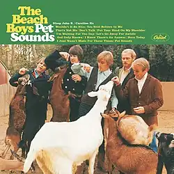 The Beach Boys at the zoo feeding apples to goats. The header displays "The Beach Boys Pet Sounds" followed by the album's track list.