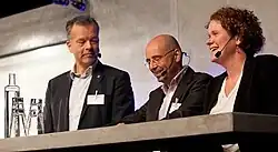 Daniel Akenine (in the middle) at the annual Stockholm meeting, May 23'th 2013 together with the principal of the Royal Institute of Technology Peter Gudmundson and the Mayor of Stockholm Karin Wanngård.