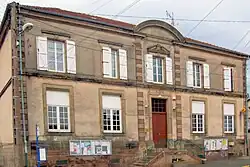 The town hall and school in Pexonne