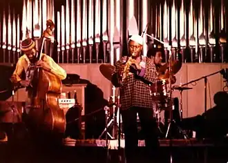 Muhammad playing with Reggie Workman and Pharoah Sanders, c. 1978
