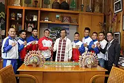 Mayor Mauricio Domogan with Philippine Boxing Team members Suarez and Ladan, alongside the Baguio trained Philippine team boxers and with their coach Romeo Brin.