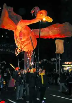 An incandescent baby phoenix conceived and designed by Sophia Michahelles of Processional Arts Workshop rises from fiery ashes to new life in 2001, after the September 11 attacks