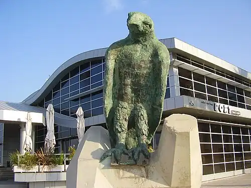Marina administration building and Eagle sculpture by Ilana Goor