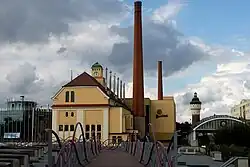 Image 30Traditional fermenting building (center) and modern fermenting building (left) in Pilsner Urquell Brewery (Czech Republic) (from History of beer)