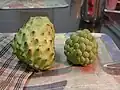 Sugar apple (right), with Taiwanese "pineapple shijia" (atemoya) (left)