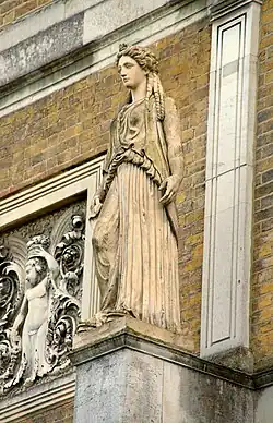 One of four caryatids on the east front of Pitzhanger Manor. Modelled on the sanctuary of Pandrosus, Athens. (See §&nbsp;Examples: Pitzhanger Manor.)
