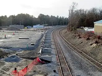 Foundations for a railway platform next to a rail line