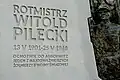 The inscription at the front of the monument.