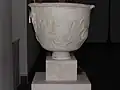 A classical marble krater decorated with cranes and snakes[43]