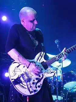 Thompson performing with the Cure in Sweden in 2007