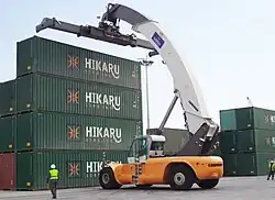 NAWAH equipment stacking containers at the Port of Basra.