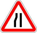 Road narrows on left