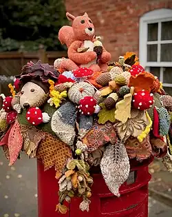 An elaborate post box topper in Collingham, Nottinghamshire at the arrival of autumn.