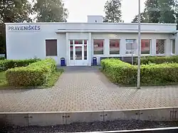 a white building with the township labeled Pravieniškės for a train station, regioonal