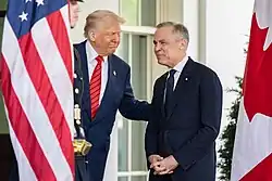 Trump welcoming Mark Carney to the White House in May 2025