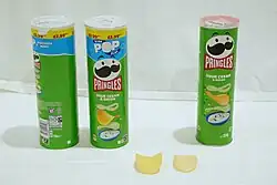 Photo showing size difference of 165g and 134g Pringles cans.