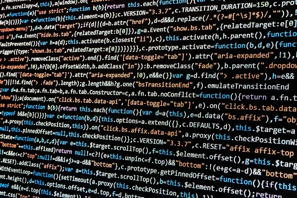 Sample of a computer program (a minified version of the BootstrapJS library) on a screen
