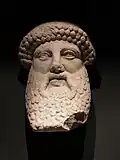 Protome from the Hadrianic period, depicting a mask to adorn theatrical buildings; masks of deities were used as dedications for the Ludi scaenici (theatrical performances).
