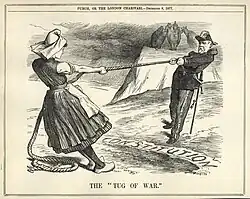 Press drawing showing a man and a woman playing tug of war. In the background, three crowned birds of prey are perched on a rock.