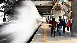 A KLIA Ekspres train passing through the station. Unlike the KLIA Transit, these trains do not stop here as they travel non-stop from KL Sentral to KLIA Terminal 1 and KLIA Terminal 2.