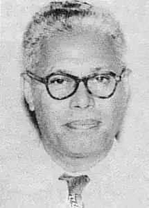 Portrait of Putuhena with glasses