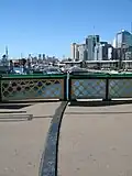 The arc-shaped split between bridge sections is shown here