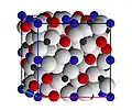 Crystal structure of pyrope garnet: White spheres are oxygen; black is silicon; blue is aluminium; and red is magnesium.