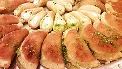Qatayef; sweet dumpling filled with cream or nuts