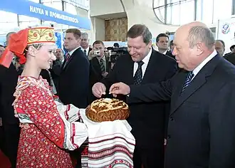 Russian Prime Minister Mikhail Fradkov and his Belarussian counterpart Sergei Sidorsky (from right to left) at the opening of a Russian national exposition underway in Minsk as part of the first Russian-Belarussian economic forum