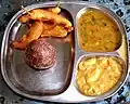 Ragi mudde and bhajji with sambar and chutney