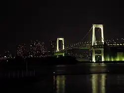 Rainbow Bridge at night, lit in white lights