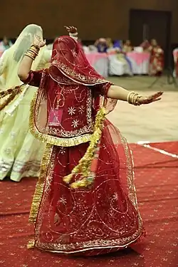 A Rajput woman performing ghoomar in Rajputi poshak