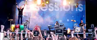 The band performing at P3sessions in Oslo, 27 May 2006. Thomas Lønnheim standing on his drums.