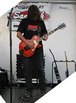 Randy Jackson plays guitar