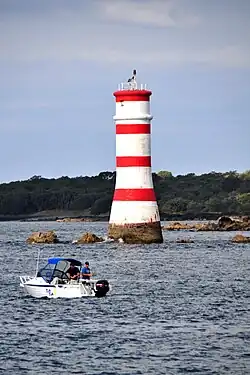 The Rangitoto Lighthouse is located along the Rangitoto Channel