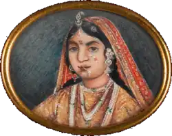 Portrait of the face of the Rani of Jhansi wearing a sari and lots of jewellery