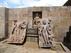 Statues in porch, Avalokiteshvara at centre.[63]