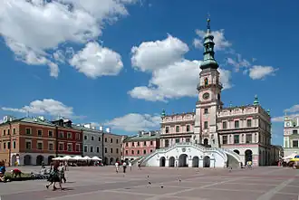 Zamość City Hall, designed by Bernardo Morando, is a unique example of Renaissance architecture in Europe, consistently built in accordance with the Italian theories of an "ideal town".[286]