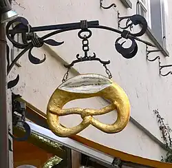 Bakery emblem with a cut[17] in the pretzel, Ravensburg, Germany