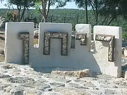 Welcoming sign at entrance to the village