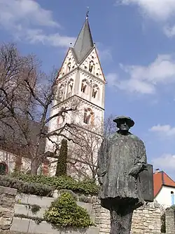 Statue of Sebastian Münster in front of St. Remigius Church, Ingelheim