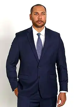 Yamil Bukele wearing a business suit