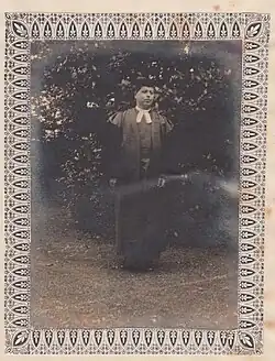 H.J. Wilkins in formal academic dress