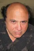 A smiling Danny DeVito