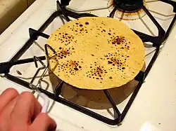 Fire-toasting papadam